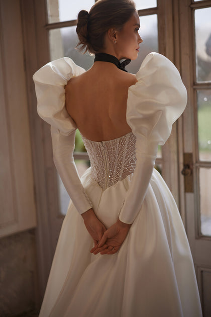 Aliette wedding dress – a crystal-embellished corset and voluminous sleeves, DAMA Couture Something Blue 2027.