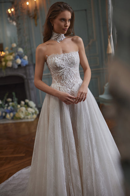 Barbarella wedding dress – a strapless sculpted bodice and floral lace skirt.