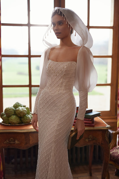 Chanin wedding dress – a clean strapless neckline and beaded fitted silhouette.