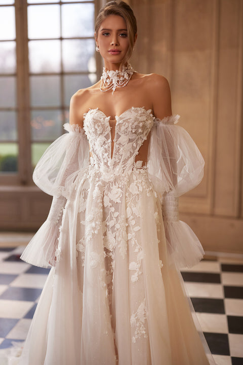 Estella wedding dress – A-line bridal gown with a dimensional floral corset and voluminous off-the-shoulder sleeves.