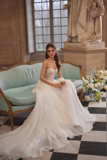 Isolde wedding dress from the Something Blue 2027 collection – a sweetheart lace corset and airy tulle skirt.