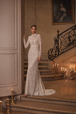 Juniona wedding dress – mermaid bridal gown with a high neckline, fitted long sleeves and geometric lace.