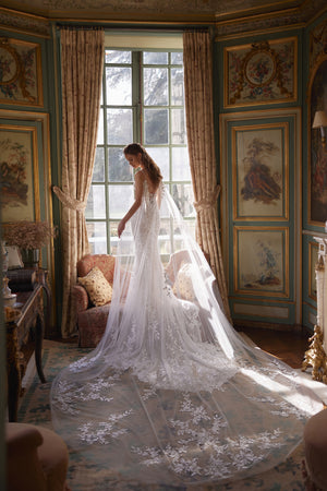 Ondine cape - sheer bridal cape falling from the shoulders, worn over the Ondine wedding dress.