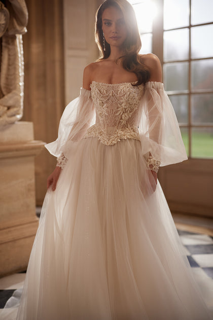 Tara corset + Tilda A-line skirt – a structured Tara corset with off-the-shoulder sleeves and the Tilda A-line skirt, DAMA Couture Something Blue 2027.