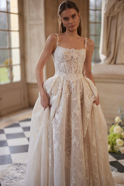 Thetis wedding dress – A-line bridal gown with sheer corsetry, lace straps and an opulent lace skirt.