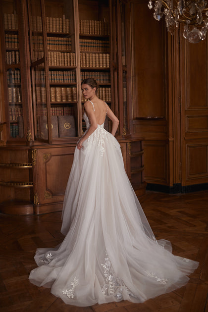 Veloria wedding dress – a V-neckline, floral straps and layered tulle skirt.