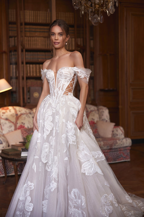 Vespera wedding dress – A-line bridal gown with an off-the-shoulder corset with a plunging neckline and sheer boning.
