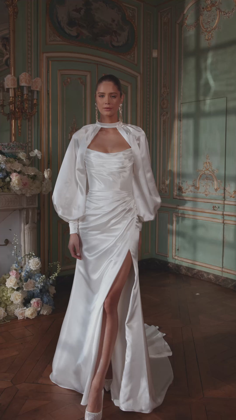 Video of the Sodden wedding dress in motion – mermaid silhouette with a softly draped strapless neckline and high slit in fluid satin.