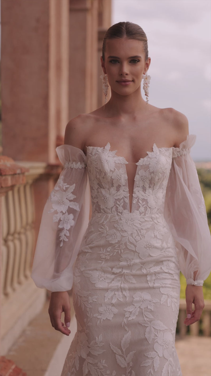 Romantyczna suknia ślubna Lucrezia z bufiastymi rękawami od DAMA Couture — film z kampanii.