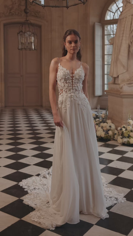 Video of the Agapia wedding dress in motion – A-line silhouette with a floral lace bodice, slender straps and airy chiffon skirt.