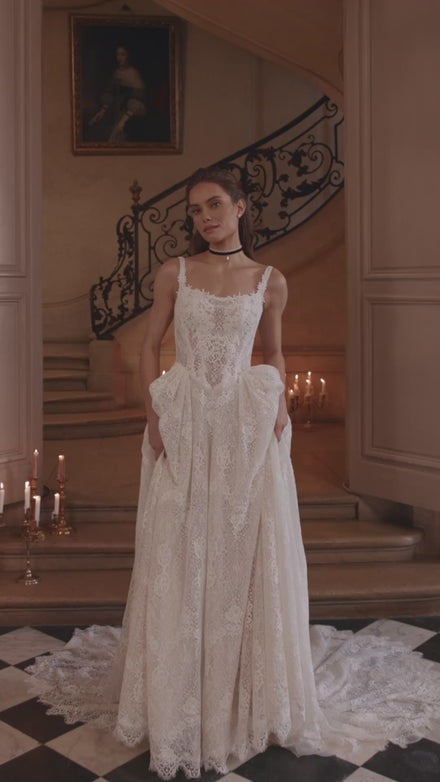 Video of the Chantira wedding dress in motion – A-line silhouette with a softly squared neckline and all-over lace skirt.