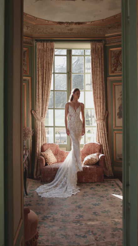 Video of the Ondine wedding dress in motion – mermaid silhouette with a plunging V-neckline and deep illusion scoop back.