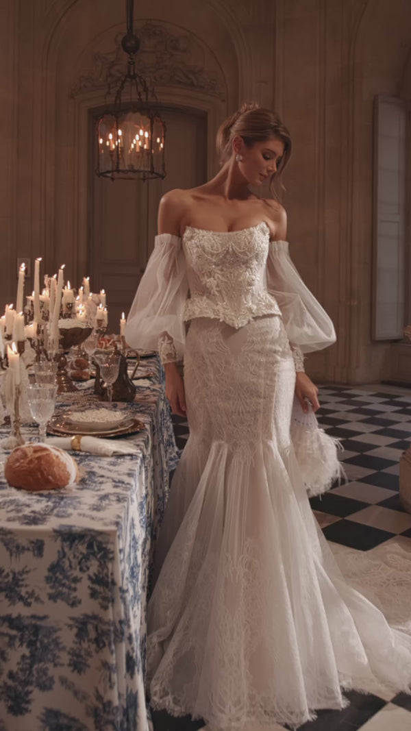 Video of the Tara corset + Thea mermaid skirt in motion – mermaid silhouette with a structured Tara corset with off-the-shoulder sleeves and the Thea mermaid skirt.